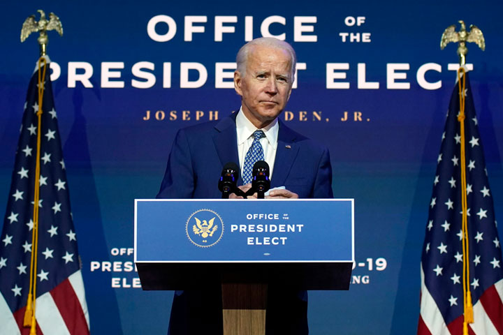 President Elect Joe Biden speaking at a podium