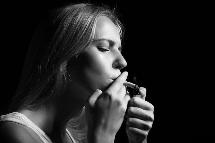 Woman smoking marijuana