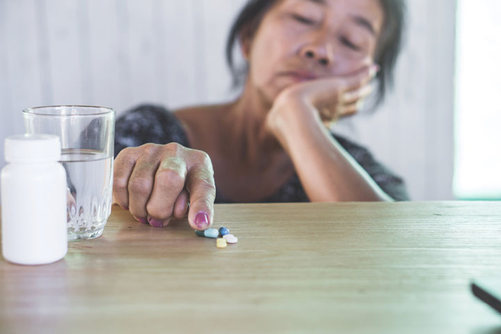 woman and her medications