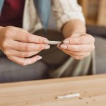 woman preparing cannabis