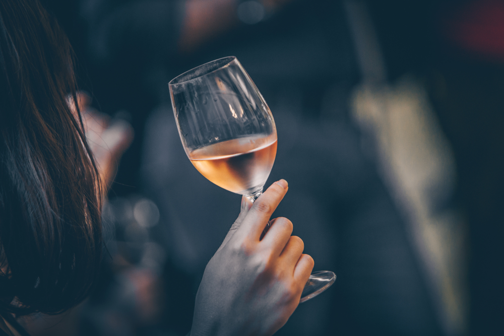 Woman drinking a glass of wine