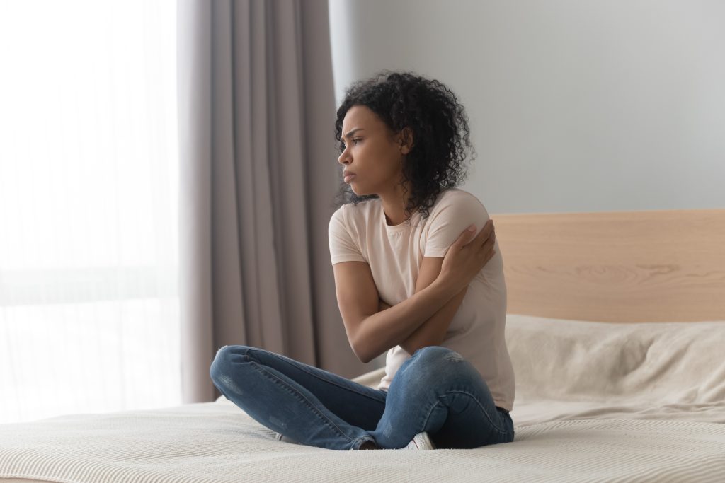 woman alone in pain
