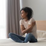 woman alone in pain