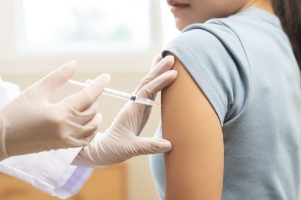 NP giving Covid vaccine