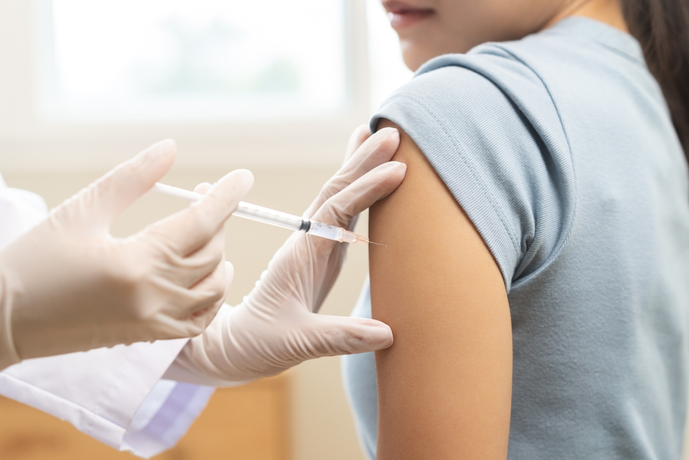 NP giving Covid vaccine
