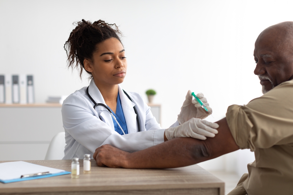 NP giving a shingles vaccine