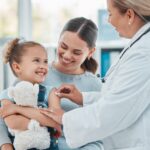 NP giving a toddler a vaccine